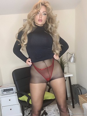 Gorgeous Lana in black pantyhose and see-through panties strips off her little black dress
